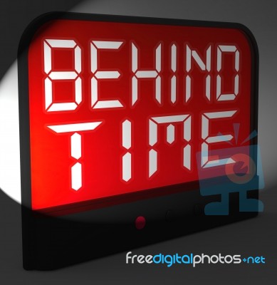 Behind Time Digital Clock Shows Running Late Or Overdue Stock Image