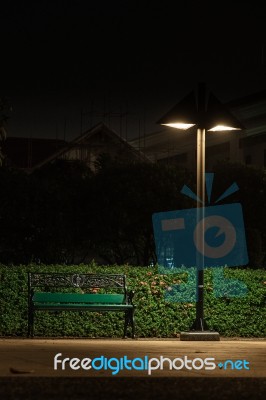 Bench Under A Lamp Stock Photo