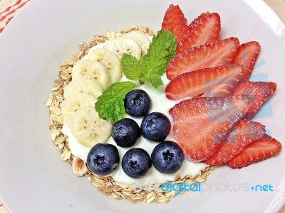 Berries Mixed Bananas With Oat Yogurt Stock Photo