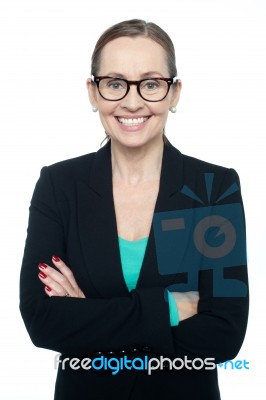 Bespectacled Woman Posing Confidently Stock Photo