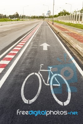 Bicycle Lane On The Side Of A Highway Stock Photo