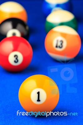 Billiard Balls In A Blue Pool Table Stock Photo