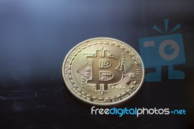 Bitcoin Curency Dof On Blue Light Background Stock Photo