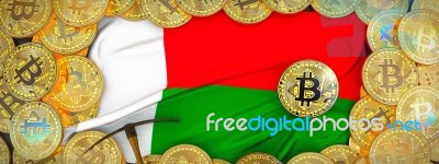 Bitcoins Gold Around Madagascar  Flag And Pickaxe On The Left.3d… Stock Image