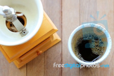 Black Coffee With Coffee Grinder Stock Photo