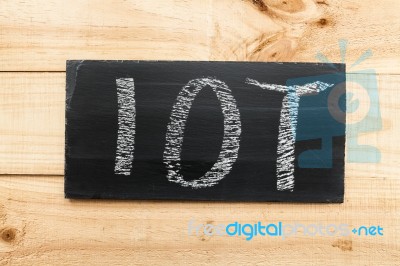 Blackboard Written With The Letters Iot, The Internet Of Things Stock Photo