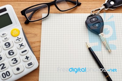 Blank Notebook With Car Key On Wood Table Stock Photo