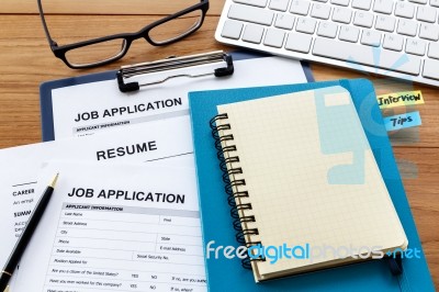Blank Notebook With Job Application Stock Photo