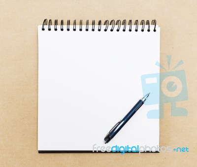 Blank Notepad With Pen On Office Table Stock Photo
