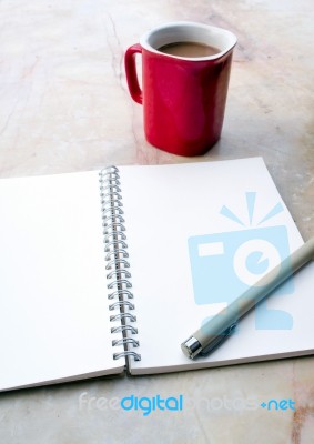 Blank Page Of A Spiral Notebook And Coffee Cup Stock Photo