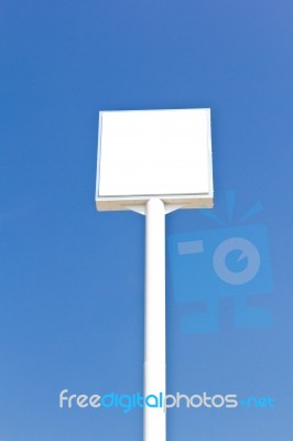 Blank Sign Against Blue Sky Stock Photo