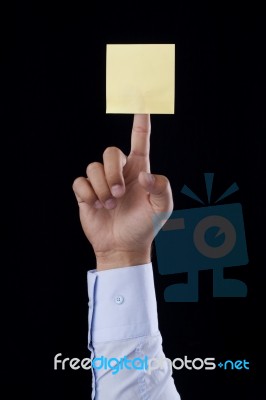 Blank Yellow Note On Finger Stock Photo