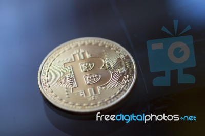 Block Chain Bitcoin Curency On Blue Light Stock Photo