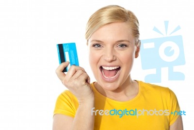 Blond Sales Girl Posing With Credit Card Stock Photo