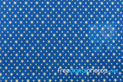 Blue Cloth With Golden Stars For Christmas Stock Photo