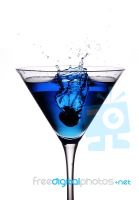 Blue Cocktail Olive Splash Stock Photo