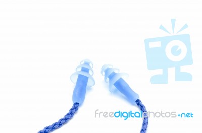 Blue Earplugs With A String On White Background Stock Photo