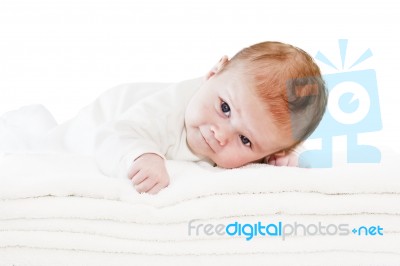 Blue Eyes Baby Boy On White Towels Stock Photo