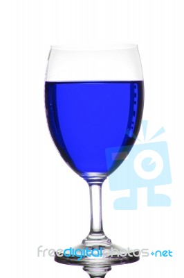 Blue Liquid In Wine Glass Stock Photo