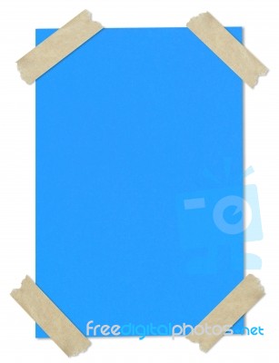 Blue Paper Stuck With Tape Stock Photo