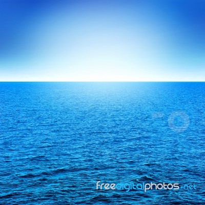 Blue Sea And Sky With Sunlight Stock Photo