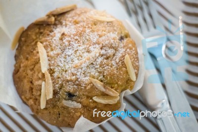 Blueberry Muffin Serving With Knife And Fork Stock Photo