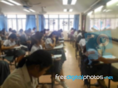 Blur Background University Students Writing Answer Doing Exam In… Stock Photo