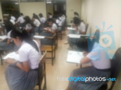 Blur Background University Students Writing Answer Doing Exam In… Stock Photo