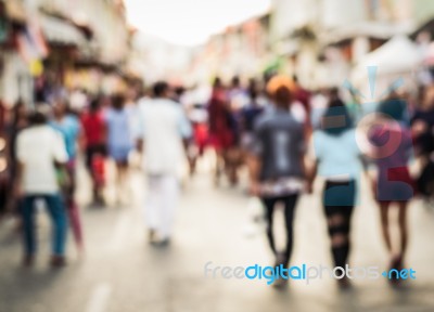 Blurred People Walking On The Street Stock Photo