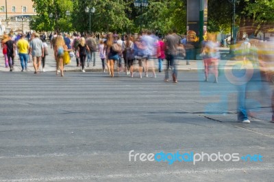 Blurry People Walking In The Street Stock Photo