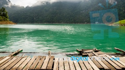 Boardwalk Front Bungalow On Green Lake Stock Photo