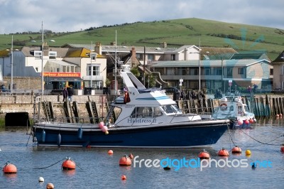 Boats In The Harbour At Lyme Regis Stock Photo