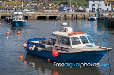 Boats In The Harbour At Lyme Regis Stock Photo