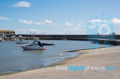 Boats In The Harbour At Lyme Regis Stock Photo