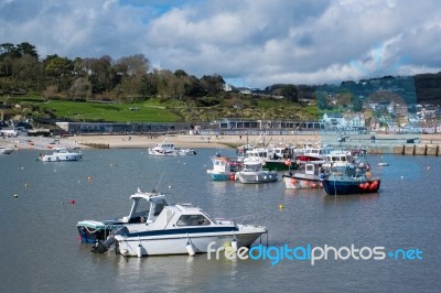 Boats In The Harbour At Lyme Regis Stock Photo