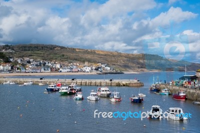 Boats In The Harbour At Lyme Regis Stock Photo