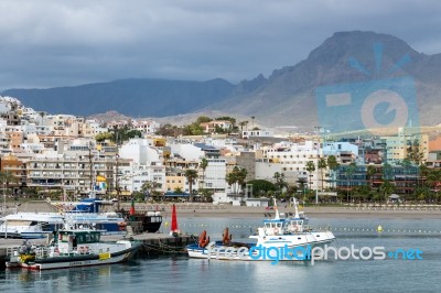 Boats Moored In Los Christianos Harbour Stock Photo
