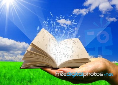 Book In One Hand Stock Photo
