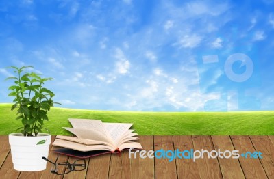 Book On Wooden Floor Stock Image