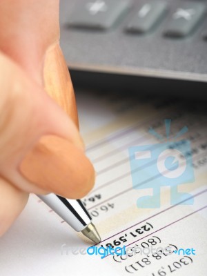 Bookkeeping With Calculator Stock Photo