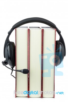 Books Wearing Headphone Stock Photo