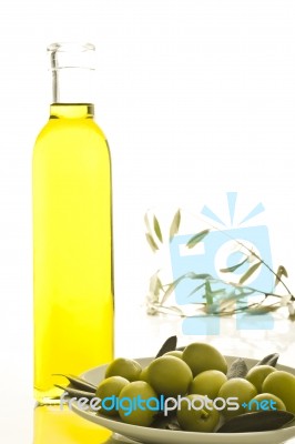 Bottle Of Olive Oil With Olives Stock Photo