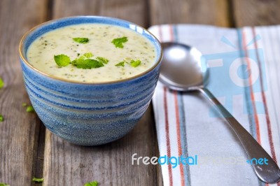 Bowl Of Broccoli And Cheddar Cheese Soup Stock Photo