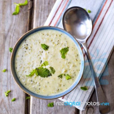 Bowl Of Broccoli And Cheddar Cheese Soup Stock Photo