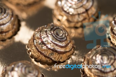 Box Of Sweet Round Chocolate Candies Stock Photo