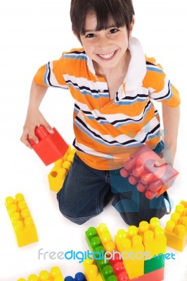 Boy Playing With Blocks Stock Photo