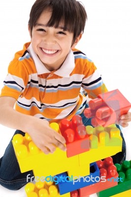 Boy Playing With Blocks Stock Photo