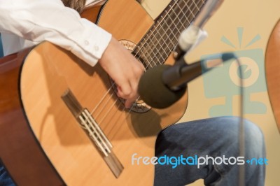 Boy Plays Guitar Stock Photo