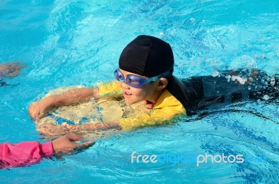 Boy Practice Swimming Stock Photo