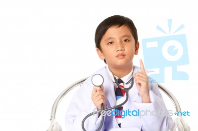 Boy With A Stethoscope Stock Photo